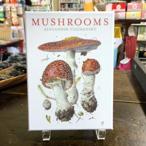 Book titled "Mushrooms" in a store