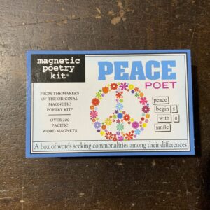 Peace-themed word magnets on a box
