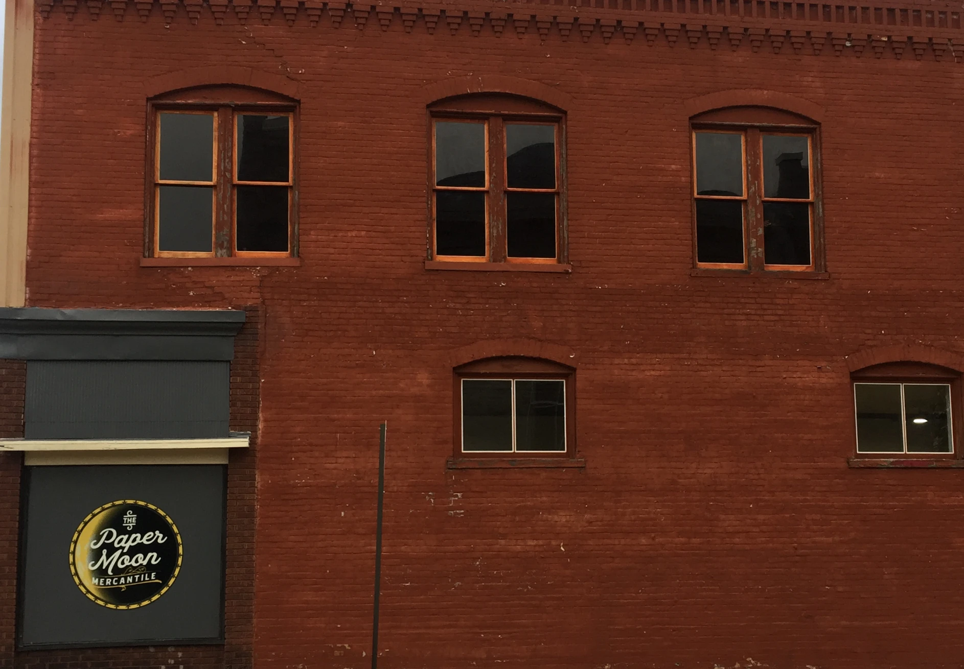 Rustic red brick wall and windows