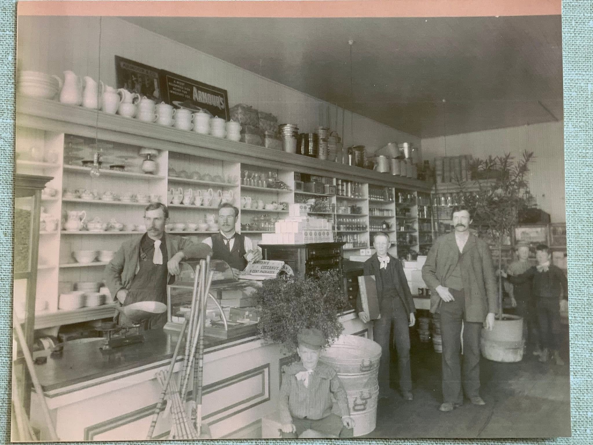 Antique shop with men in suits