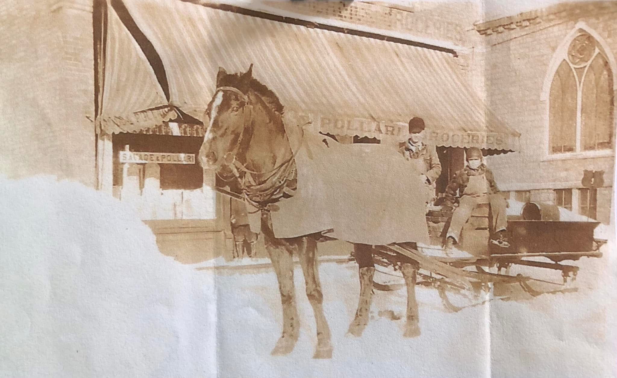 Horse-drawn sleigh in historical setting