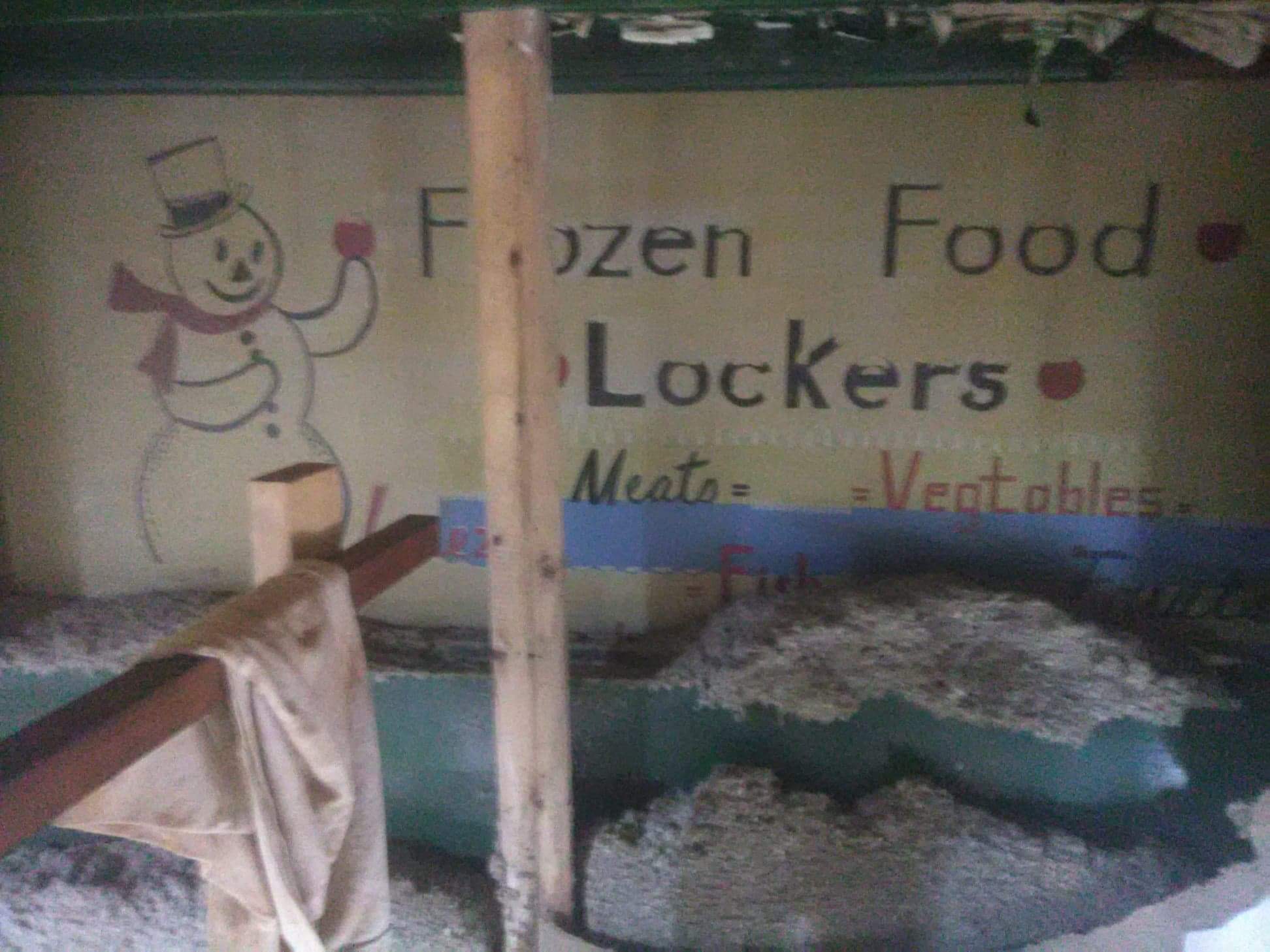 Old mural with snowman and text