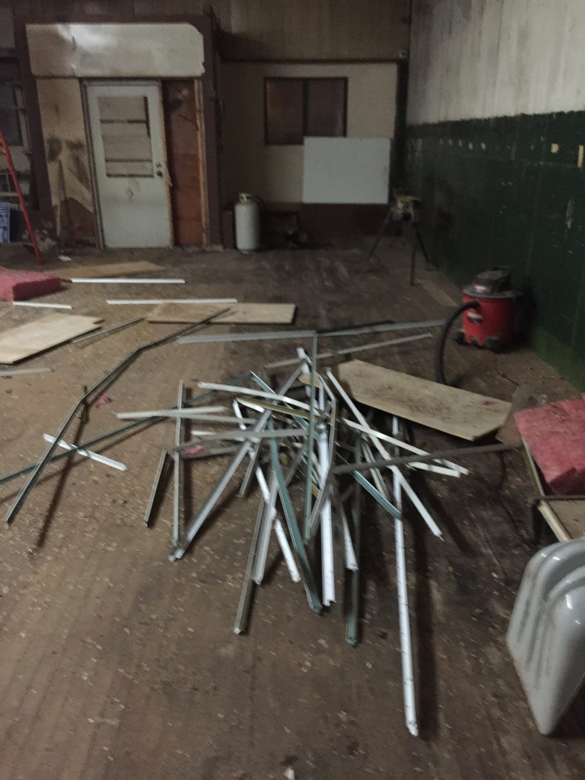 Messy room with scattered metal pieces