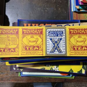 Colorful Tokay tea packaging collection displayed.