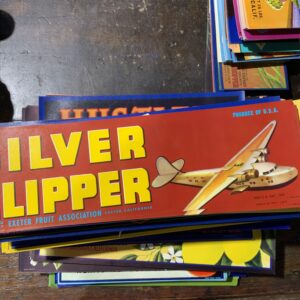 Retro airplane-themed fruit label design